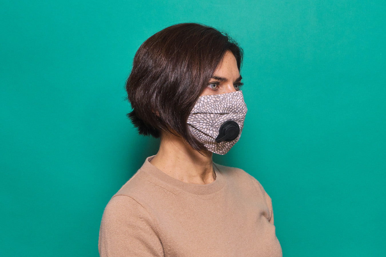 The Suck It Socket Adult mask in gray floral with black socket